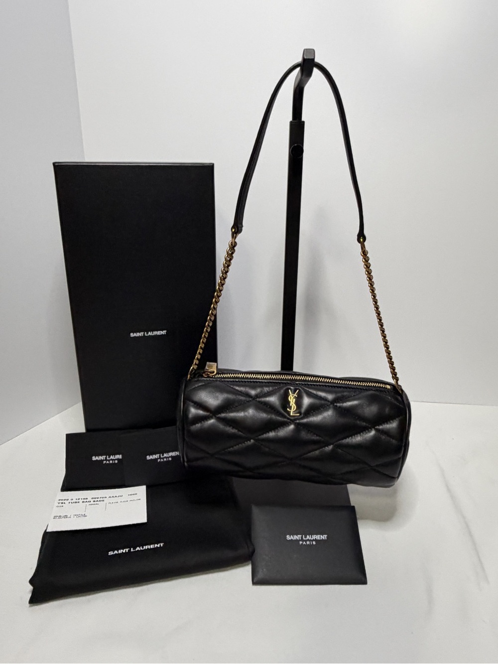 Saint Laurent Black Quilted Leather Barrel Bag with Gold Chain
